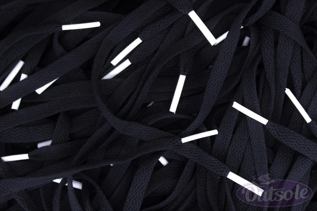 Black Nike laces White tips