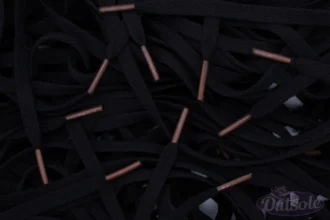 Black Nike laces Taupe tips