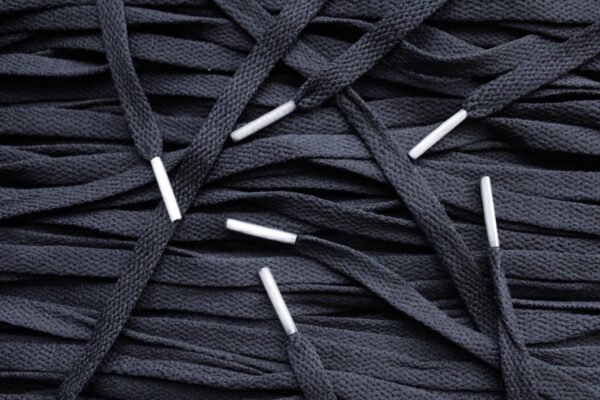 Black Nike laces Transparent White tips